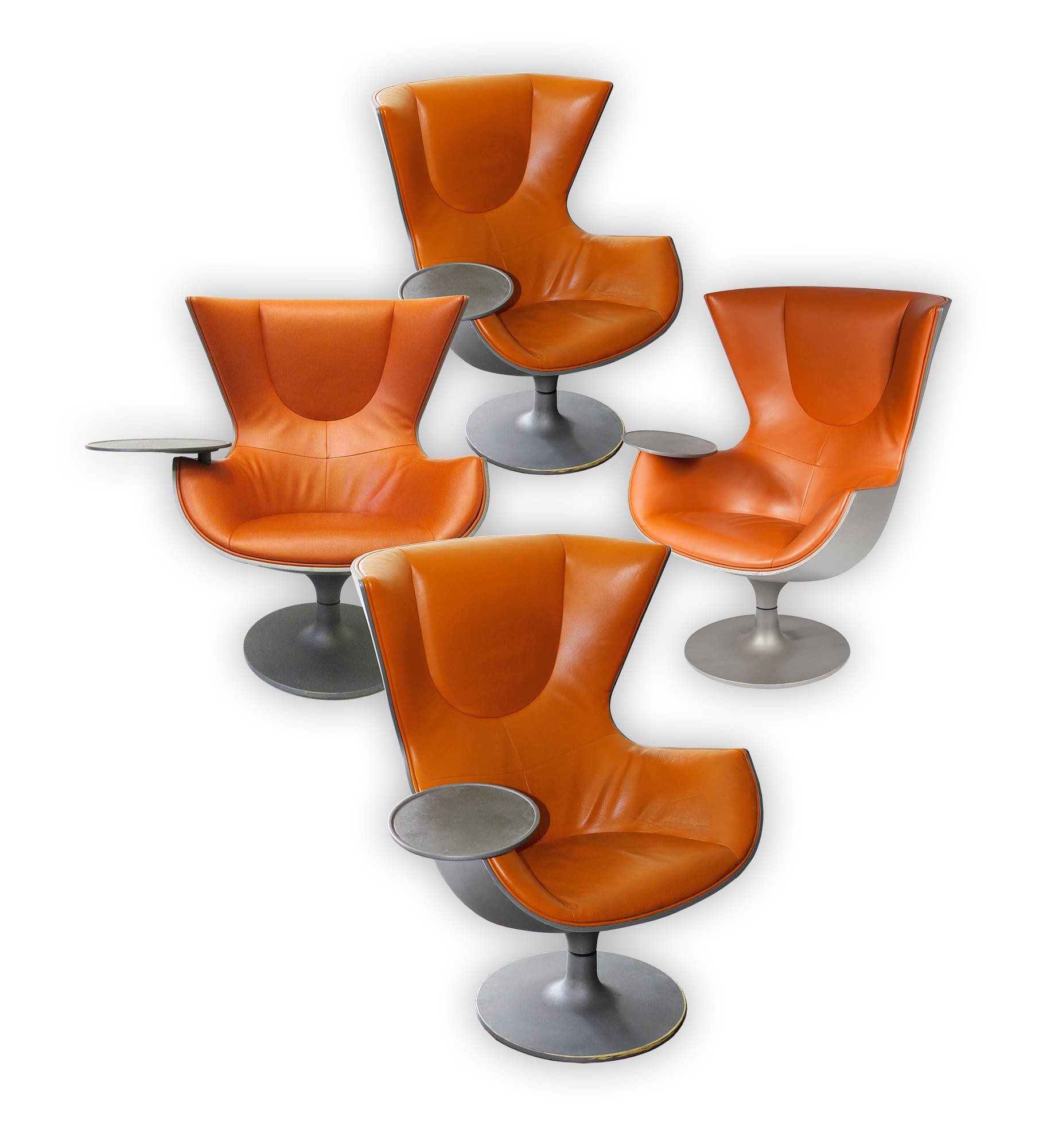 Philippe Starck Eurostar armchair with beautiful tan leather upholstery and a built-in swivel table